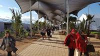 People walking in and out of the climate talks in Marrakech