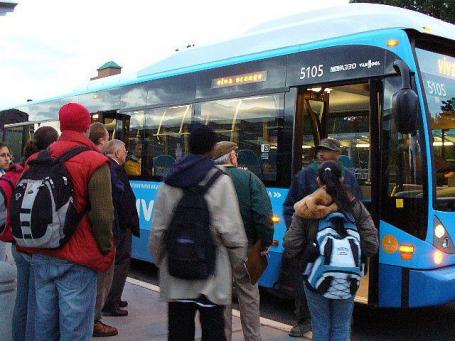 Passengers boarding bus