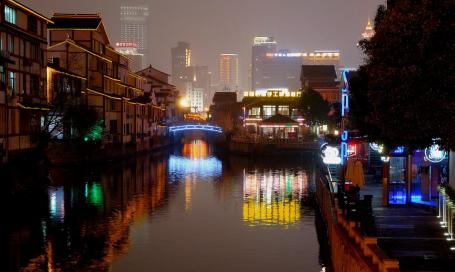 City with river at night