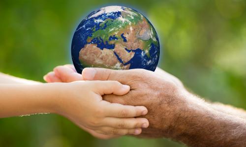 Hands on globe
